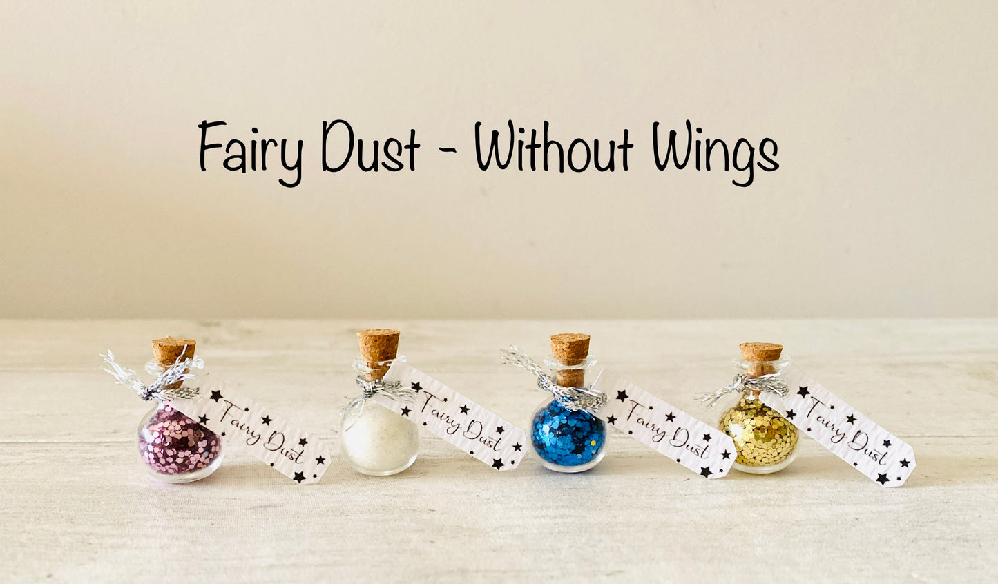 Fairy Dust Bottles with Fairy Wings perfect gift from the Tooth Fairy or Fairy Party Bag Fillers / Wedding Favours -mini Fairy Dust Bottles