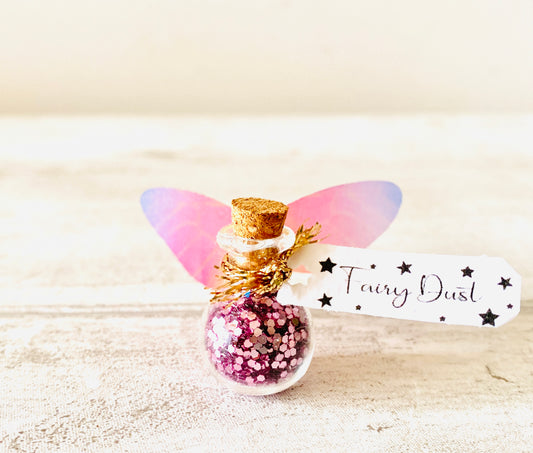 Fairy Dust Bottles with Fairy Wings perfect gift from the Tooth Fairy or Fairy Party Bag Fillers / Wedding Favours -mini Fairy Dust Bottles